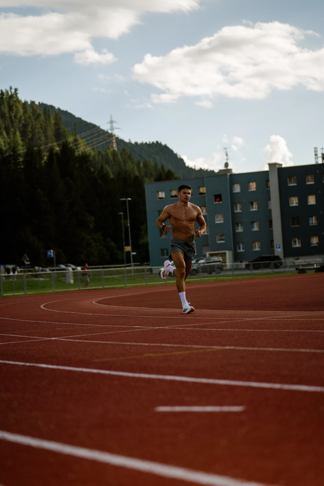 Murray Clark running on an athletics track